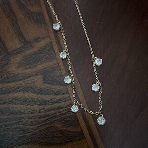 Gold toned necklace with small round  crystals